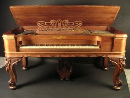 AN AMERICAN VICTORIAN WILLIAM MOORE MAHOGANY SQUAR: AN AMERICAN VICTORIAN WILLIAM MOORE MAHOGANY SQUARE GRAND PIANO, the hinged rectangular top above the ivory key board and raised on large cabriole legs ending in scroll feet. Height: 38", width: 77",