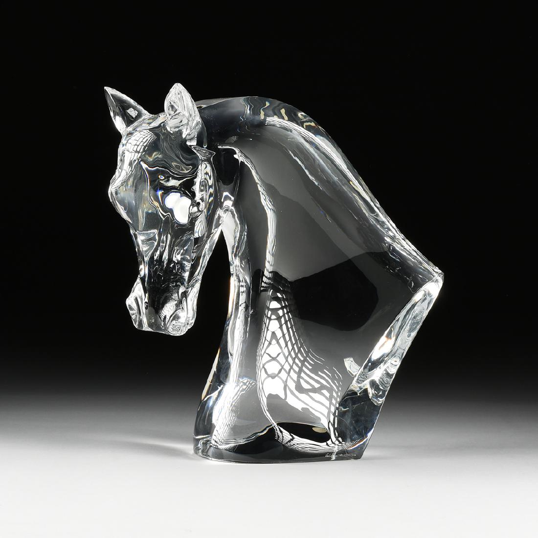 A VINTAGE MAISON LALIQUE ART GLASS SCULPTURE, "Tête de: A VINTAGE MAISON LALIQUE ART GLASS SCULPTURE, "Tête de Cheval," DESIGNED 1953, signed at base, "Lalique France" with encircled R. Height: 18" Note: With original leatherette, custom foam lined case.