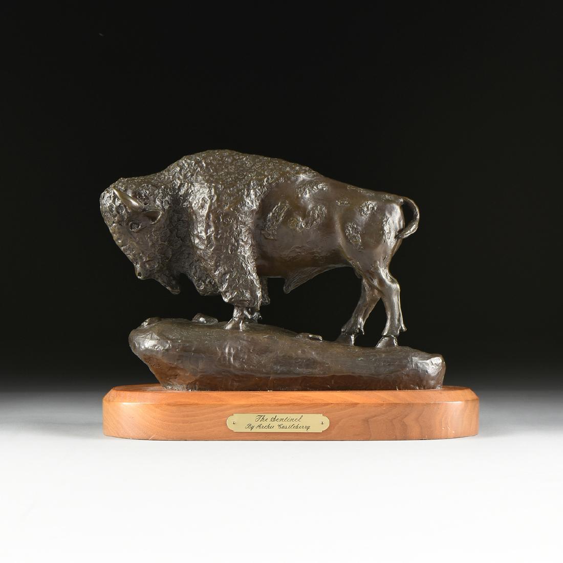 ARCHIE CASTLEBERRY (AMERICAN 1932-2013) A BRONZE: ARCHIE CASTLEBERRY (AMERICAN 1932-2013) A BRONZE BUFFALO SCULPTURE, "The Sentinel," the patinated cast bronze model of a buffalo bull standing on a shaped oval stylized groundwork base, incised monogr