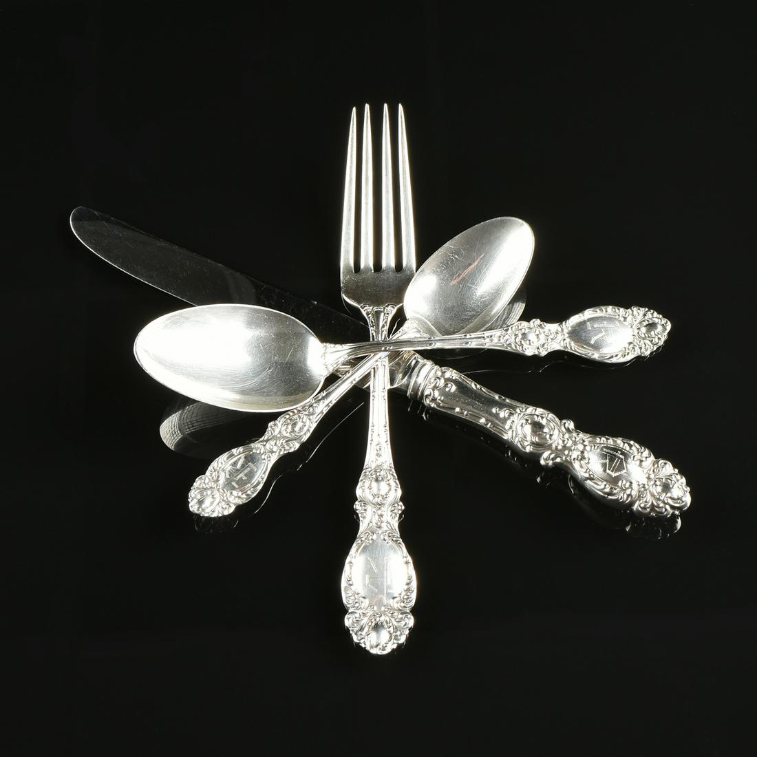A FORTY-NINE PIECE R. WALLACE & SONS STERLING SILVER: A FORTY-NINE PIECE R. WALLACE & SONS STERLING SILVER FLATWARE SERVICE, LUCERNE PATTERN, MARKED, EARLY 20TH CENTURY, each in the traditional pattern with reverse side molded "RW&S" with stag head mark,