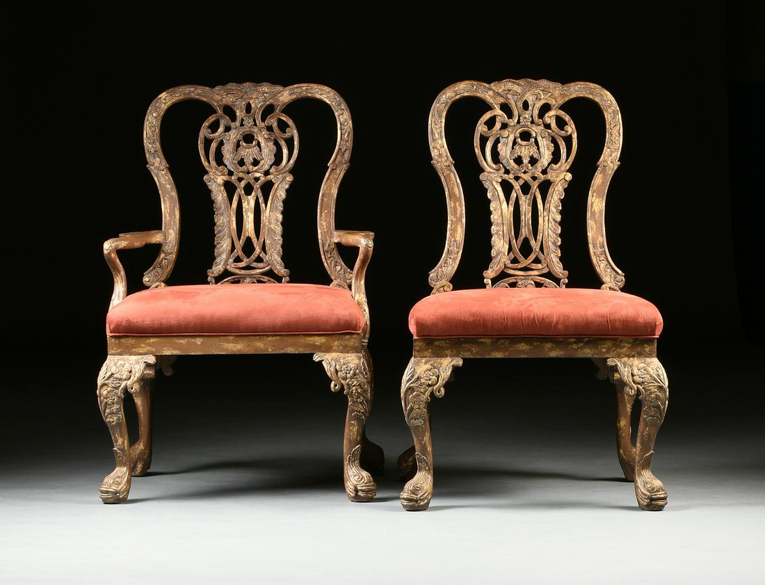 A SET OF EIGHT GEORGE II STYLE SILVER LEAF CARVED WOOD: A SET OF EIGHT GEORGE II STYLE SILVER LEAF CARVED WOOD DINING CHAIRS, MODERN, comprising two armchairs and six side chairs, each generously proportioned and with a triple arched crestrail above a reti