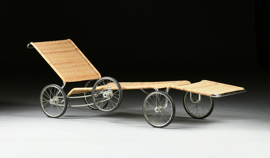 A VINTAGE BAUHAUS CHAISE LOUNGE, "F41 Couch on Wheels,": A VINTAGE BAUHAUS CHAISE LOUNGE, "F41 Couch on Wheels," after MARCEL BREUER (1902-1981), GERMAN, BY TETCA, CIRCA 1984, natural cane and tubular steel on bicycle style spoked wheels, originally designe