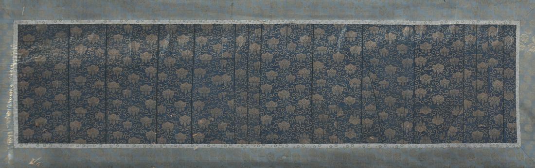 A LONG ANTIQUE JAPANESE BULLION AND DEEP BLUE SILK: A LONG ANTIQUE JAPANESE BULLION AND DEEP BLUE SILK BROCADE TEMPLE HANGING, POSSIBLY IMPERIAL OR FUJIWARA FAMILY, EDO PERIOD, LATE 18TH/EARLY 19TH CENTURY, of elongated rectangular form and centering a