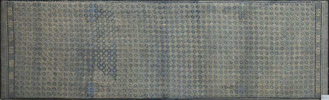 A JAVANESE GILT BLUE COTTON BATIK SARONG, INDONESIA,: A JAVANESE GILT BLUE COTTON BATIK SARONG, INDONESIA, EARLY 20TH CENTURY, this sarong or prada is of traditional rectangular form with an applied gold leaf repetitive lozenge pattern on blue cotton bat