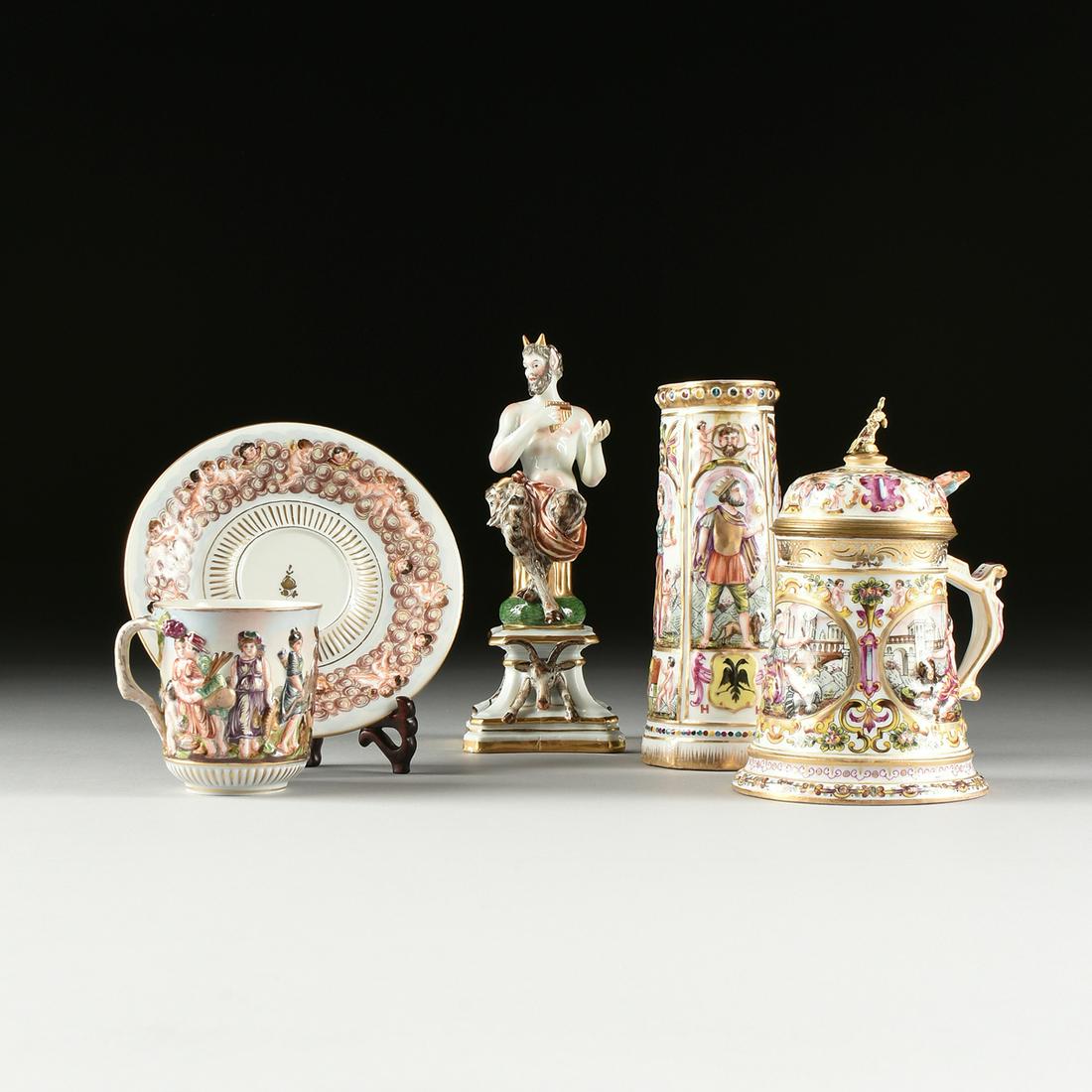 A GROUP OF FOUR PIECES OF CAPODIMONTE PORCELAIN,: A GROUP OF FOUR PIECES OF CAPODIMONTE PORCELAIN, GERMANY, 20TH CENTURY, comprising an Amazon hunt theme tea cup and putti cloud saucer; a small vase with heraldic shields and personifications of peace
