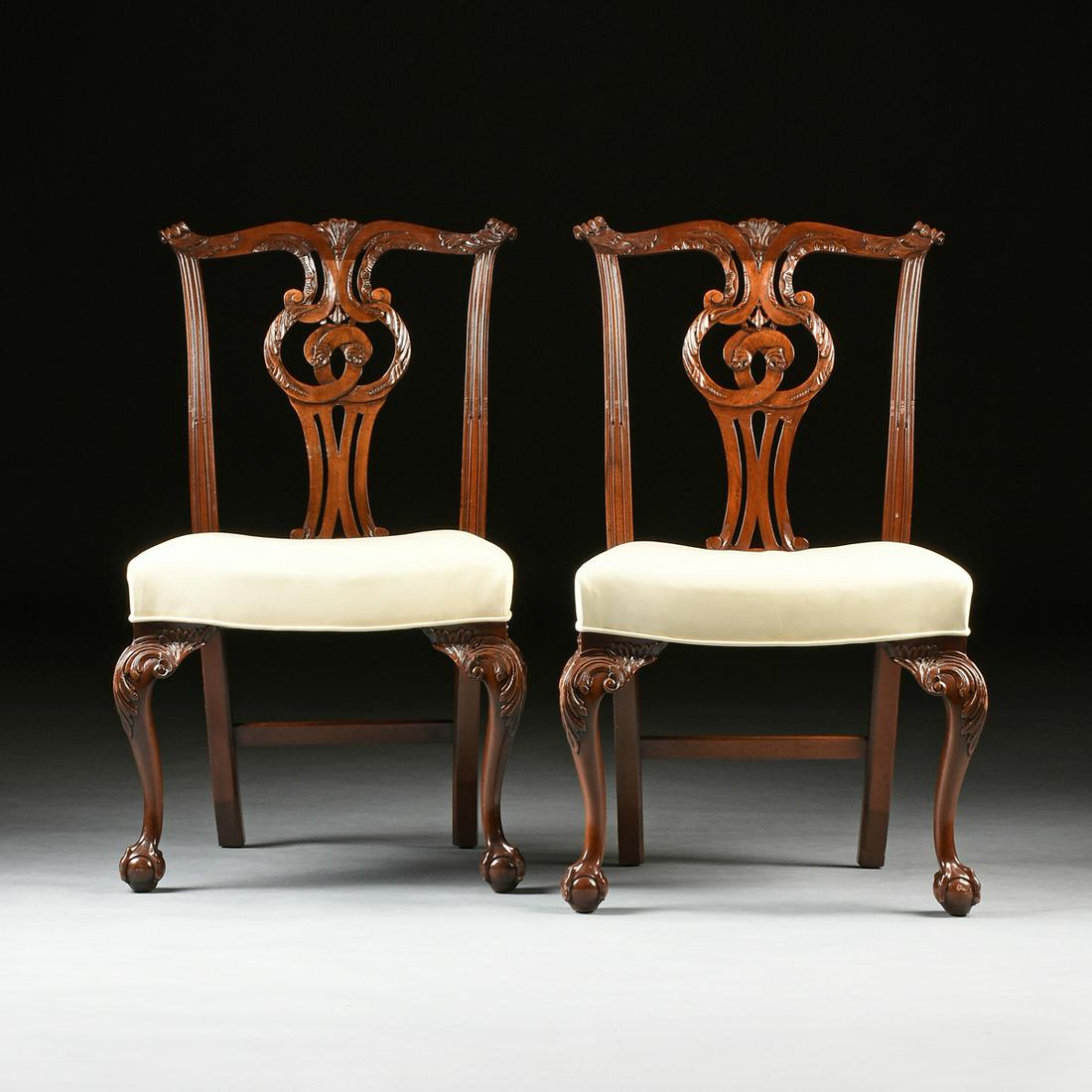after THOMAS CHIPPENDALE (1718-1779) A GROUP OF SIX: after THOMAS CHIPPENDALE (1718-1779) A GROUP OF SIX MAHOGANY AND LEATHER DINING CHAIRS, 20TH CENTURY, in the Massachusetts taste, each yoke shaped crestrail centering a bell flower bloom, flanked by c