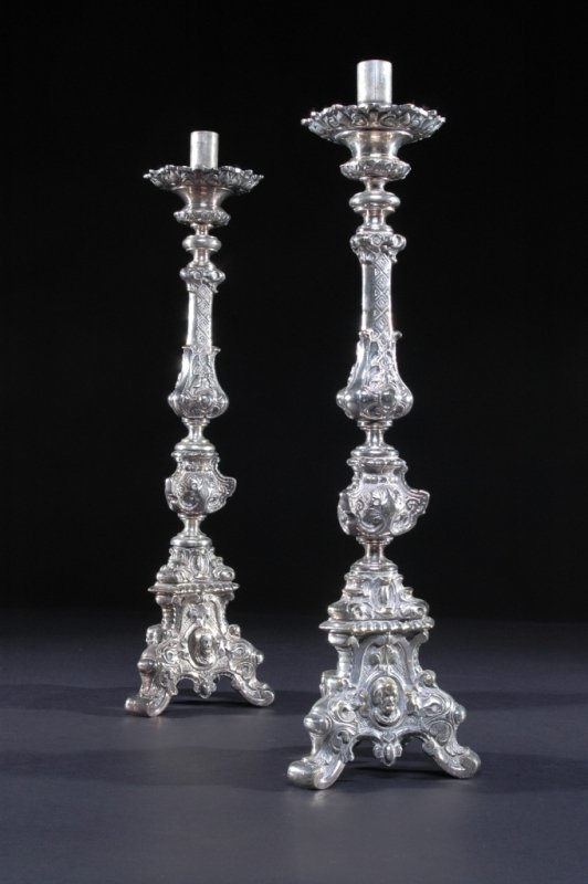 A PAIR OF ITALIAN BAROQUE STYLE SILVER PLATED BRON