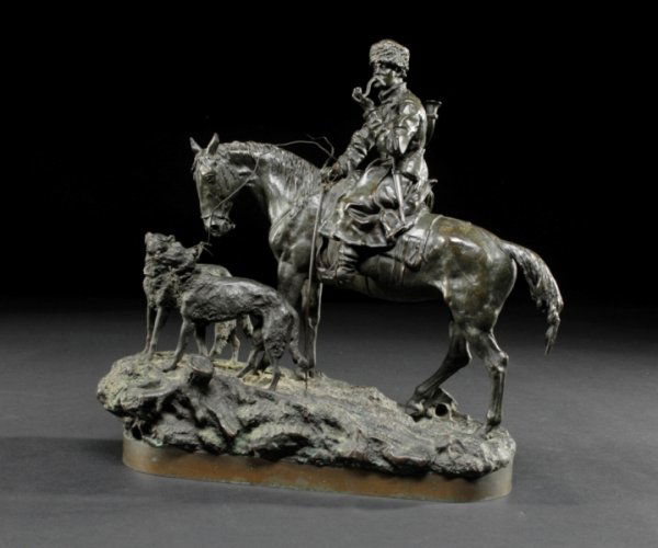 VASSILI YACOVLEVICH GRACHEV (Russian 1831-1905) A: VASSILI YACOVLEVICH GRACHEV (Russian 1831-1905) A BRONZE FIGURAL GROUP OF A COSSACK on horseback with wolfhounds, signed in Cyrillic LBP Grachev and inscribed with foundry marks Fabr. C.F. Woerfel S.
