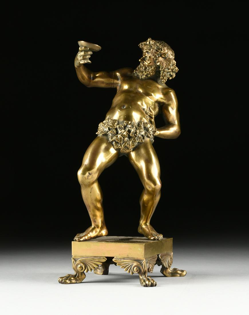 AFTER THE ANTIQUE GILT BRONZE SCULPTURE OF A DRUNKEN: AFTER THE ANTIQUE GILT BRONZE SCULPTURE OF A DRUNKEN BACCHUS, SIGNED CODINA V, POSSIBLY SPANISH, LATE 19TH/EARLY 20TH CENTURY, realistically modeled as the scantily clad Bacchus wearing a grape leaf c