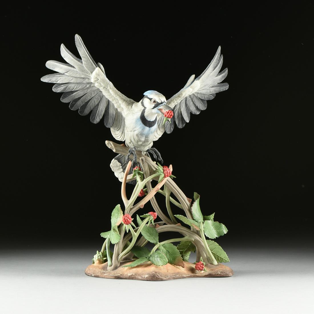 A BOEHM SCULPTURE, "Blue Jay," UNITED STATES,: A BOEHM SCULPTURE, "Blue Jay," UNITED STATES, hand painted bisque porcelain, number 78, verso maker's mark. Height: 17.00" Width: 15.00" Depth: 8.00"