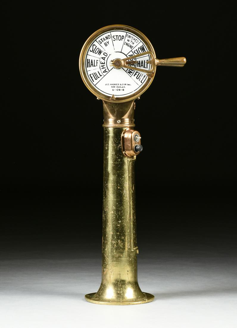 A VINTAGE AMERICAN BRASS SHIP ENGINE TELEGRAPH, BY: A VINTAGE AMERICAN BRASS SHIP ENGINE TELEGRAPH, BY HARPER & SON WITH DURKEE MARINE PRODUCTS CORP, NEW YORK, 20TH CENTURY, the twin milk glass faced drum form case on an octagonal neck and circular col