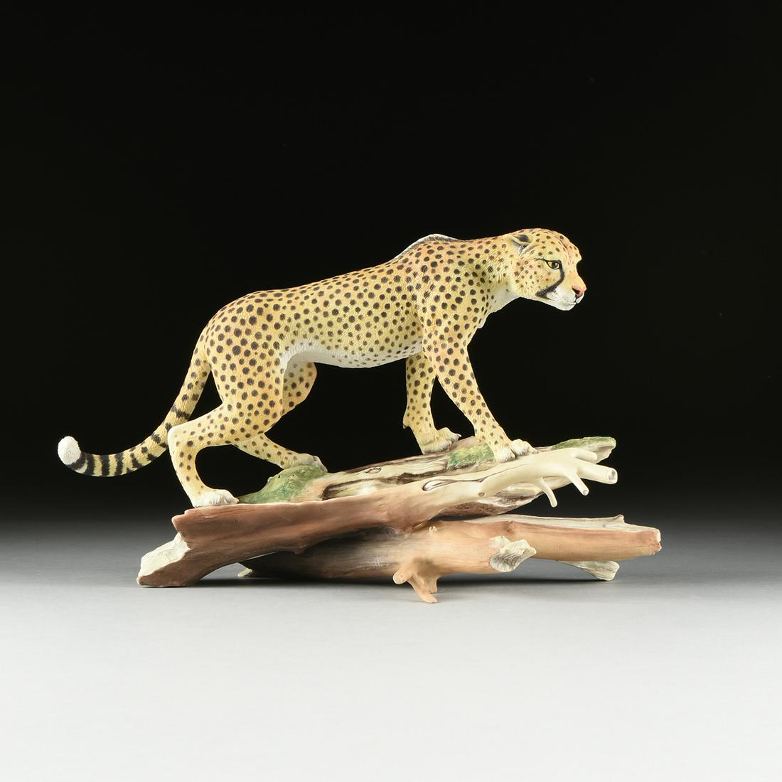 A BOEHM SCULPTURE, "Cheetah," LONDON, 1980,: A BOEHM SCULPTURE, "Cheetah," LONDON, 1980, hand painted bisque porcelain, number 8, verso maker's mark. Height: 10.25" Width: 15.00" Depth: 7.00"