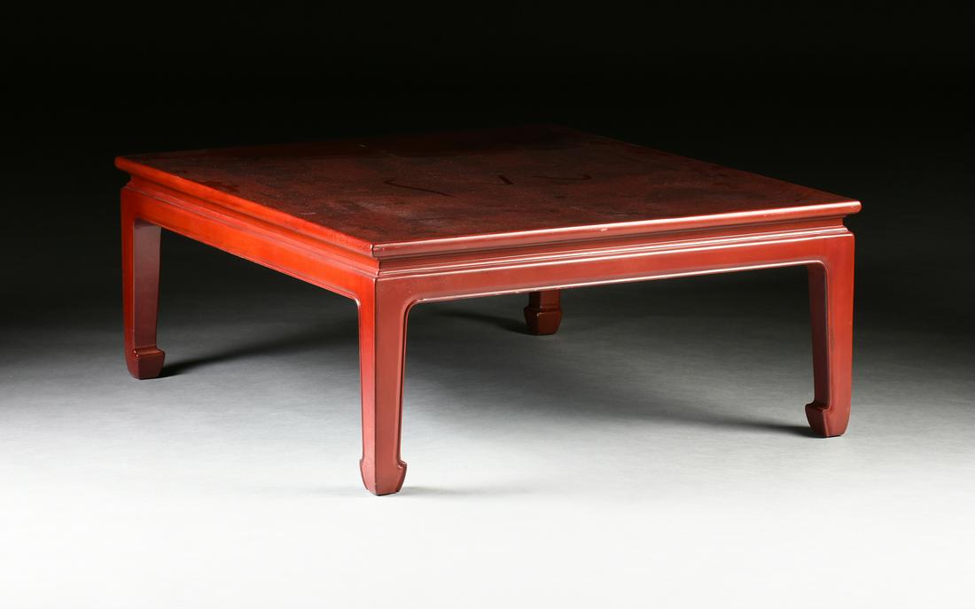 A MODERN CHINOISERIE RED VARNISHED AND SILVER LEAF: A MODERN CHINOISERIE RED VARNISHED AND SILVER LEAF COFFEE TABLE, LATE 20TH CENTURY, the rectangular two panel top centering pavilions with a nobleman and his family along with a retinue of attendants