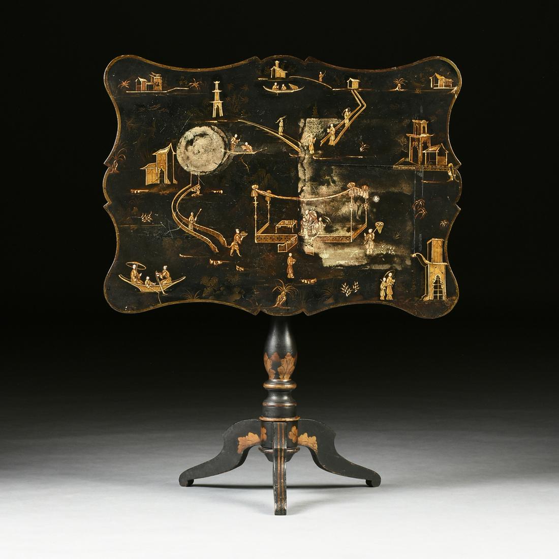 A VICTORIAN PARCEL GILT AND BLACK LACQUERED CHINOISERIE: A VICTORIAN PARCEL GILT AND BLACK LACQUERED CHINOISERIE TILT TOP TEA TABLE, ENGLISH, THIRD QUARTER 19TH CENTURY, the shaped rectangular hinged top enclosing gilt Chinese figures at various pursuits in