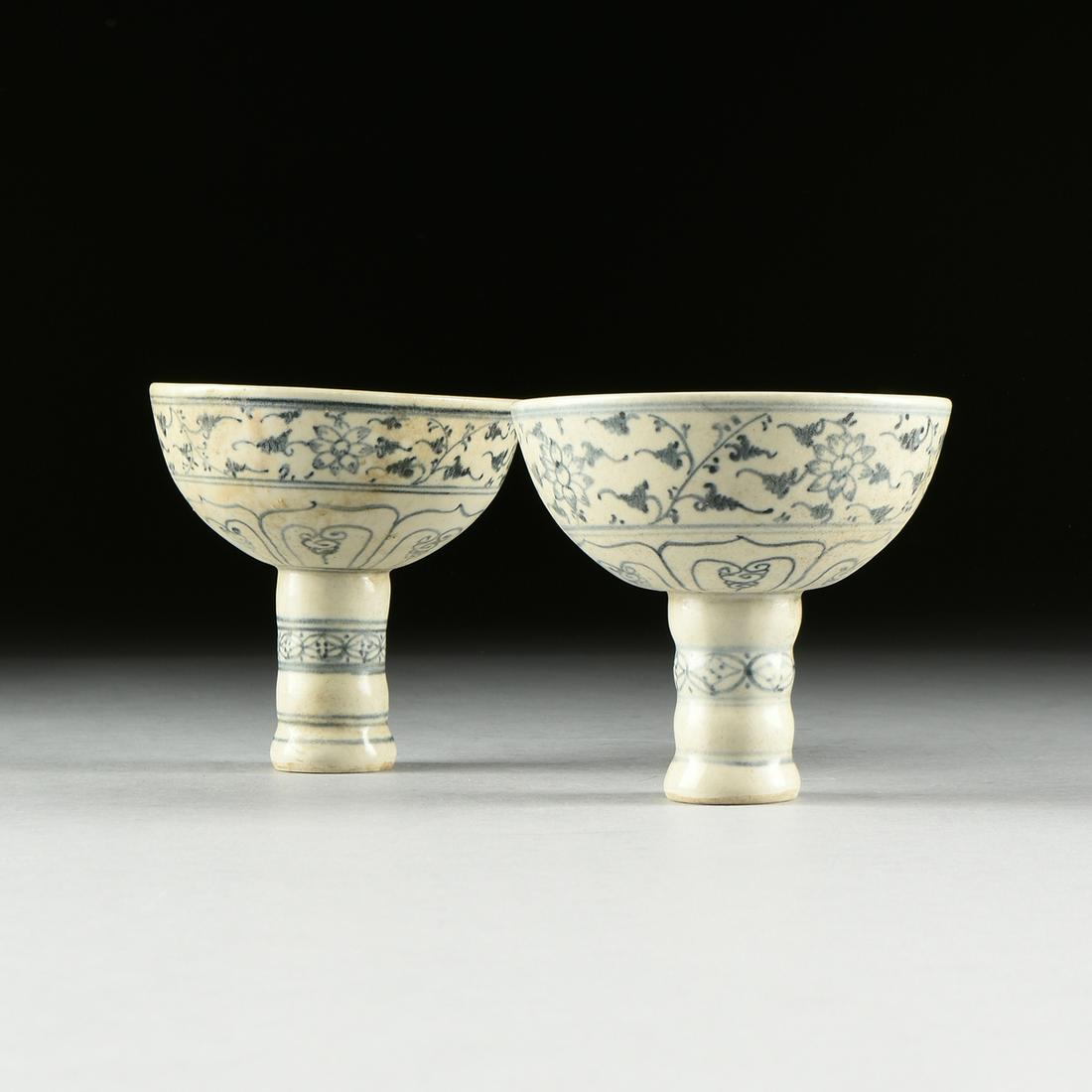 A PAIR OF VIETNAMESE/ANNAMESE BLUE AND WHITE PORCELAIN: A PAIR OF VIETNAMESE/ANNAMESE BLUE AND WHITE PORCELAIN PEDESTAL STEM BOWLS, SHIPWRECK ARTIFACTS, 15TH/16TH CENTURY, each with a tapering bowl form body and sides painted with a continuous rim border o
