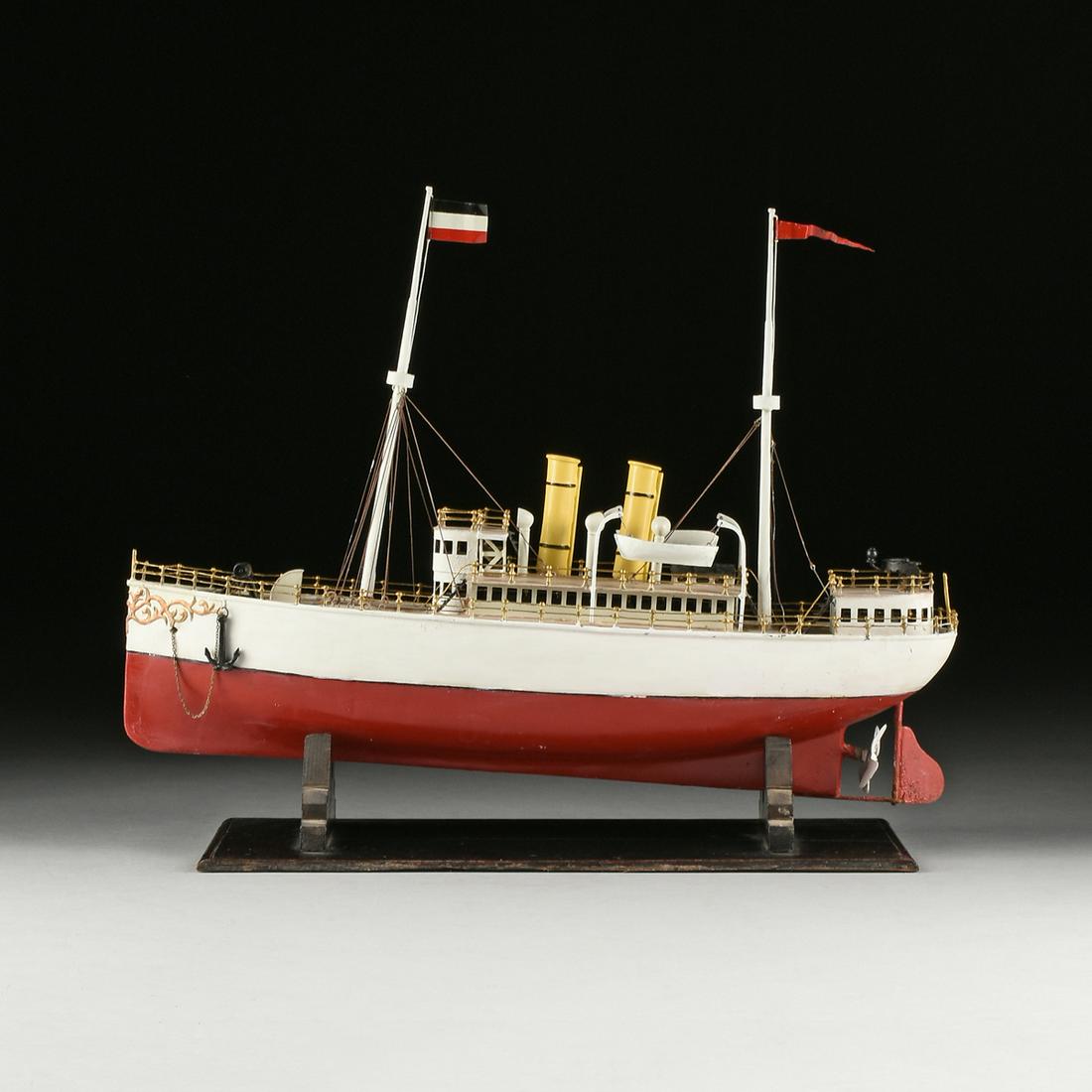 A VINTAGE GERMAN PAINTED TIN STEAM POWERED MODEL BOAT,: A VINTAGE GERMAN PAINTED TIN STEAM POWERED MODEL BOAT, POSSIBLY BING, CIRCA, 1923, with two masts flanking two smokestacks and realistically detailed with miniature multi level deck, steering, lifeboa