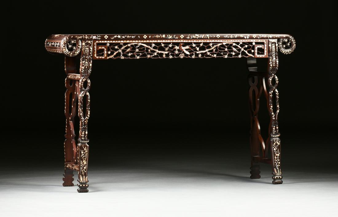 A CHINESE EXPORT MOTHER OF PEARL INLAID CARVED HARDWOOD: A CHINESE EXPORT MOTHER OF PEARL INLAID CARVED HARDWOOD ALTER TABLE, MODERN, the rectangular top centering a broad single hardwood plank enclosed by a frame form border and scrolled ends, inlaid with