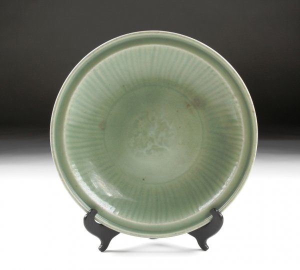 A FINE CHINESE MING DYNASTY CELADON CHARGER, the c
