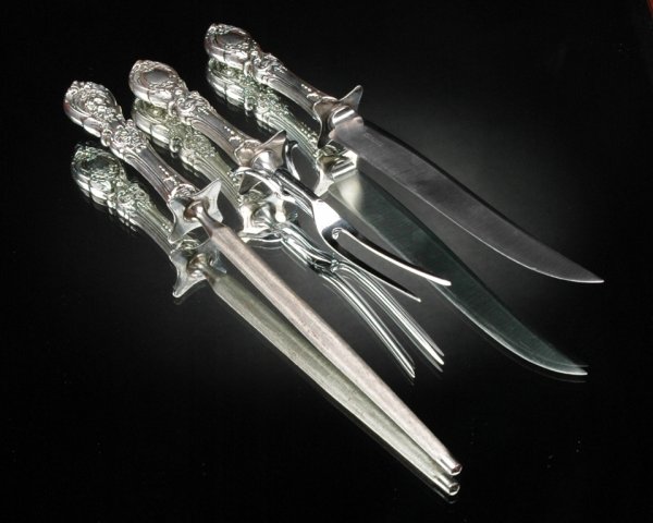 A THREE PIECE STERLING SILVER CARVING SERVICE by R