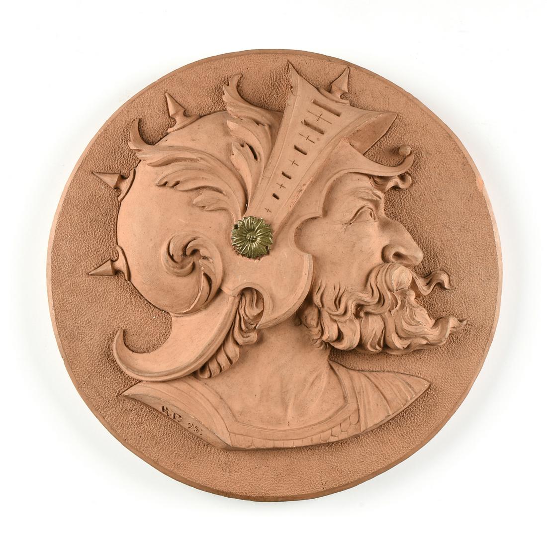 A RENAISSANCE REVIVAL TERRACOTTA MEDALLION PORTRAIT OF: A RENAISSANCE REVIVAL TERRACOTTA MEDALLION PORTRAIT OF A ROMAN SOLDIER, SIGNED, CIRCA 1915, terracotta in relief, in the Italian taste, the spiked helmet with applied lacquered bronze mount at visor, 