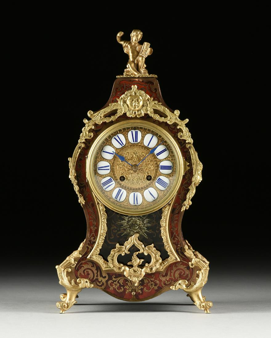 A LOUIS XIV STYLE ORMOLU MOUNTED BOULLE MARQUETRY: A LOUIS XIV STYLE ORMOLU MOUNTED BOULLE MARQUETRY BRACKET CLOCK, LATE 19TH CENTURY, the short rectangular pedestal crest surmounted by a seated putto on a balloon form case with gilt maiden's mask sus