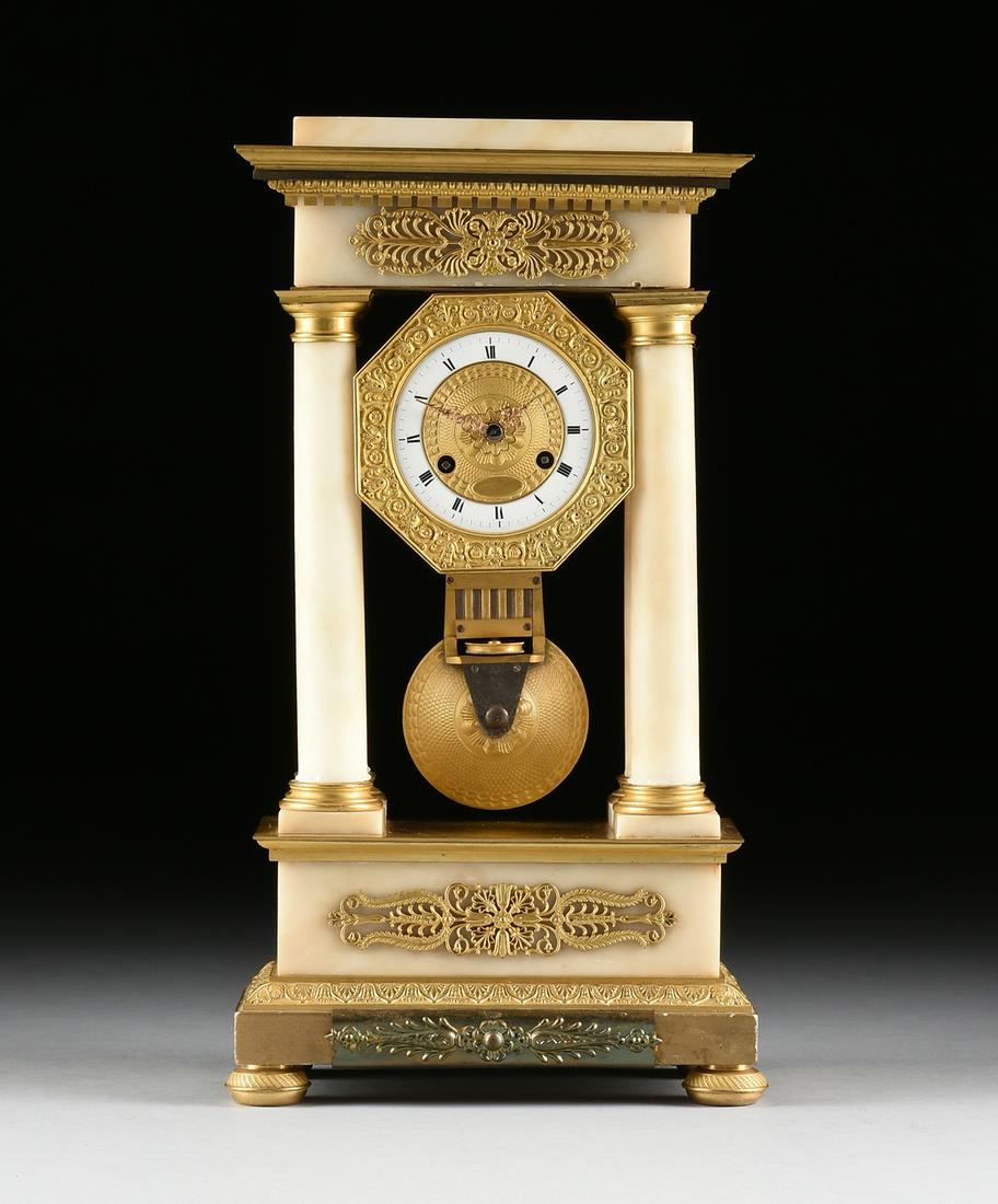 A RESTAURATION GILT BRONZE MOUNTED WHITE ALABASTER: A RESTAURATION GILT BRONZE MOUNTED WHITE ALABASTER PORTICO CLOCK, 1820s, the rectangular marble block and bronze molding form cornice above egg-and-dart and dentillated bands, on a frieze centering re