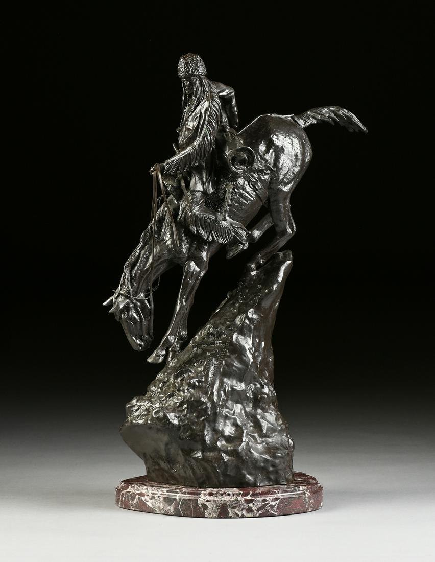 after FREDERIC REMINGTON (American 1861-1909) A BRONZE: after FREDERIC REMINGTON (American 1861-1909) A BRONZE SCULPTURE, "The Mountain Man," with a glossy dark blackish brown patina and a steep shaped mountainside form base inscribed "Copyright By / Frede