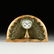 AN ART DECO BRONZE PEACOCK AND SIENA MARBLE MANTLE