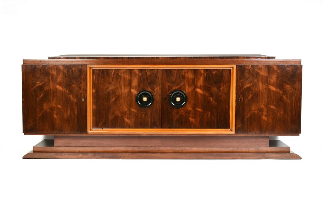 AN ART DECO ROSEWOOD, MAHOGANY AND MAPLE CREDENZA,: AN ART DECO ROSEWOOD, MAHOGANY AND MAPLE CREDENZA, POSSIBLY AMERICAN, 1930s, of rectangular form and centering a recessed slightly raised conforming panel ending before the case top, above paired fron