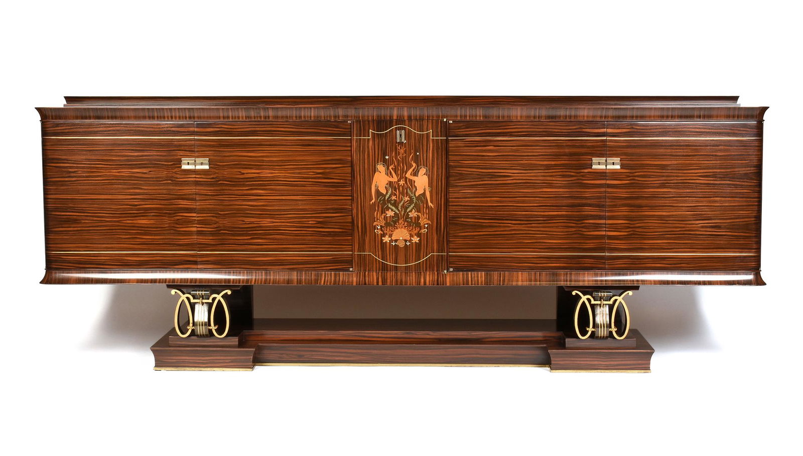 AN ELEGANT FRENCH ART DECO EXOTIC WOODS MARQUETRY: AN ELEGANT FRENCH ART DECO EXOTIC WOODS MARQUETRY INLAID MACASSAR EBONY AND GILT IRON CREDENZA, POSSIBLY BY JULES LELEU, PAULE LELEU, AND GILBERT POILLERAT, TOULOUSE, 1930s, The rectangular top center