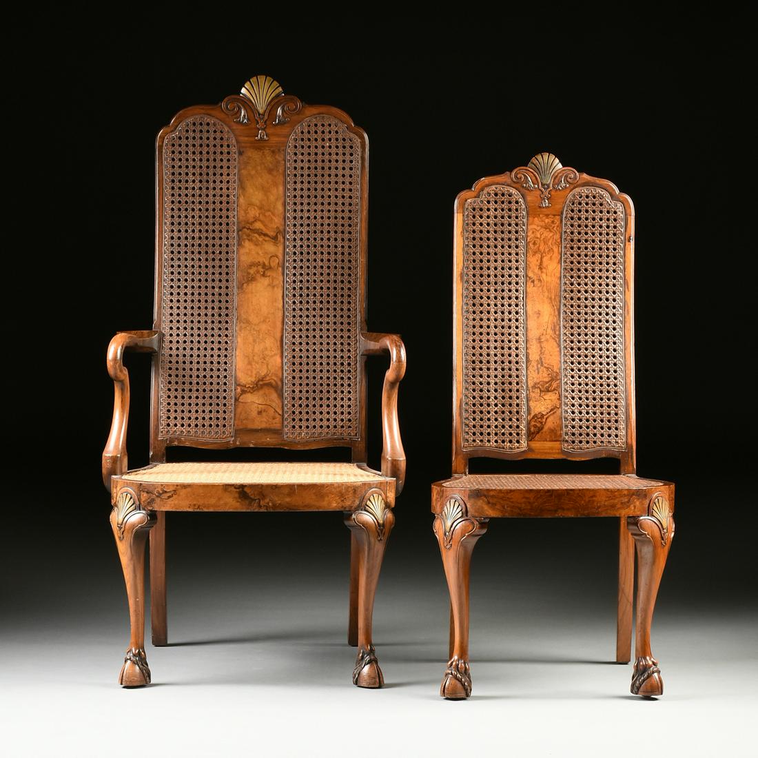 TEN QUEEN ANNE STYLE CLOVEN HOOF FEET CANE BACK WALNUT: TEN QUEEN ANNE STYLE CLOVEN HOOF FEET CANE BACK WALNUT DINING CHAIRS, EARLY/MID 20TH CENTURY, comprising two armchairs and eight side chairs with parcel gilt shell crestrail over shaped dual cane pane