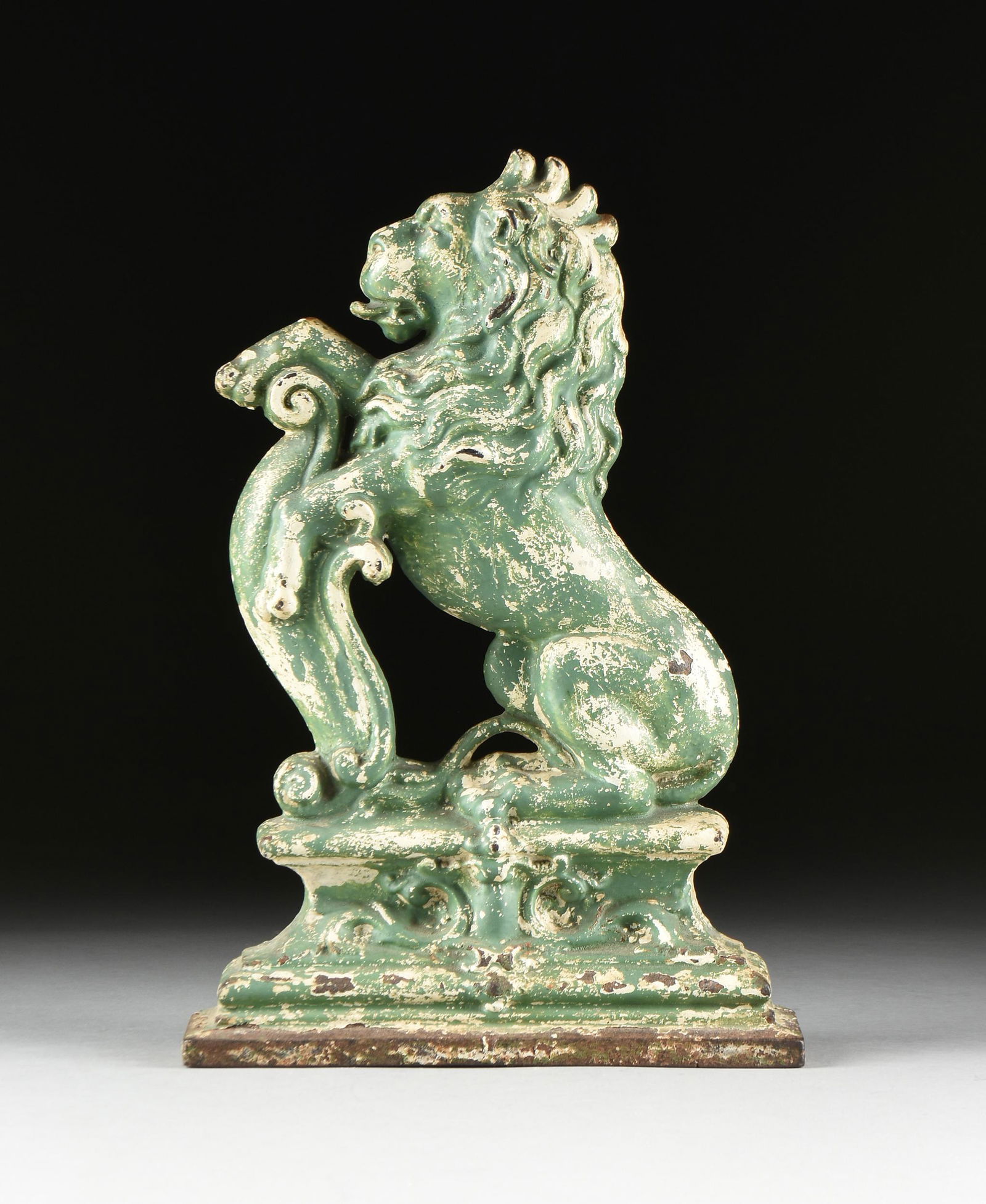 A VICTORIAN GREEN PAINTED CAST IRON ARMORIAL LION (1 of 5)