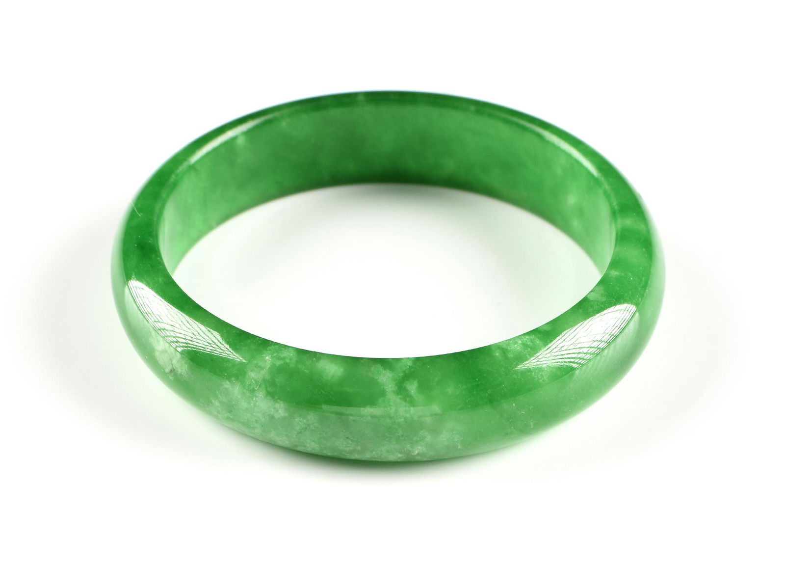 A CHINESE APPLE GREEN JADEITE JADE BANGLE BRACELET, MID (1 of 2)