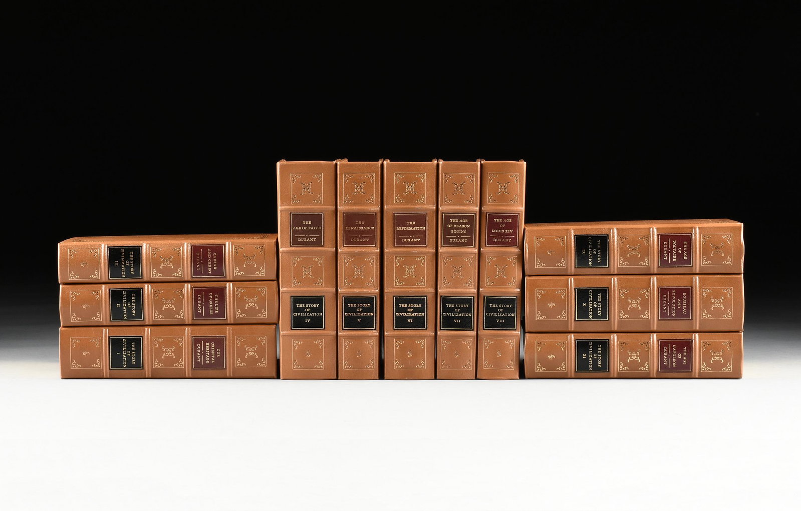 A GROUP OF ELEVEN EASTON PRESS TITLES FROM DURANT, "The: A GROUP OF ELEVEN EASTON PRESS TITLES FROM DURANT, "The Story of Civilization," LATE 20TH CENTURY, gilt embossed genuine leather bound classics. Height: 9 1/2" Width: 6 1/2"