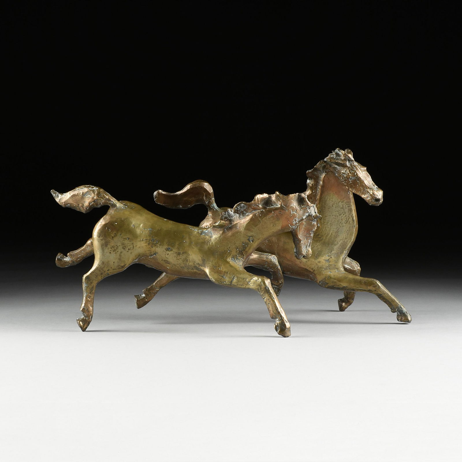 DAVID ADICKES (American/Texas b. 1927) A SCULPTURE,: DAVID ADICKES (American/Texas b. 1927) A SCULPTURE, "Mustangs," cast brass, each horse signed, one in relief and one engraved in brass, "Adickes." Height: 13" Width: 22 1/2" Depth: 12"