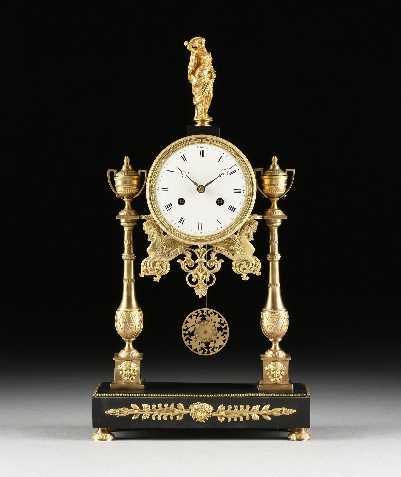 A DIRECTOIRE GILT BRONZE AND BLACK MARBLE MANTLE CLOCK, (1 of 13)
