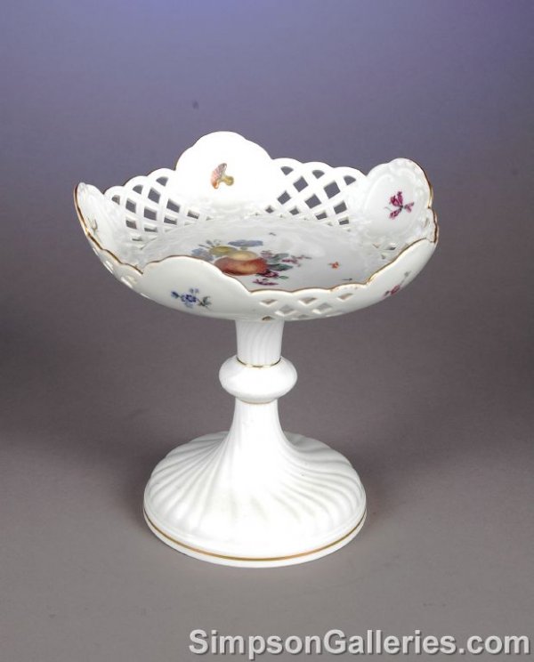 A MEISSEN DECORATED COMPOTE, the reticulated tape