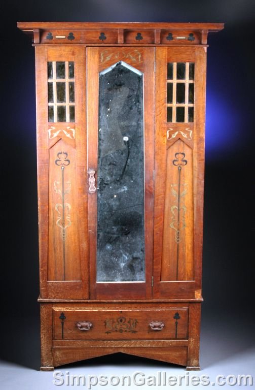 AN ENGLISH ARTS & CRAFTS OAK ARMOIRE, early 20th