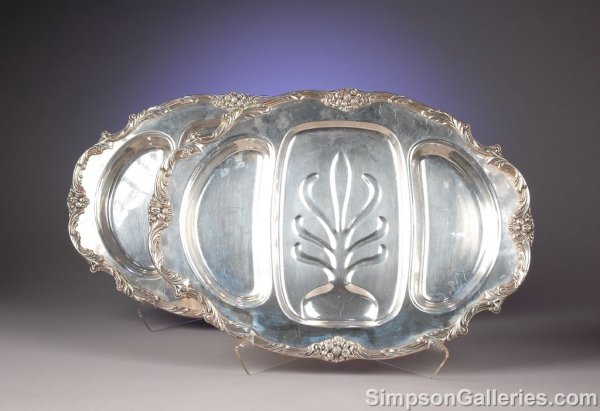 A PAIR OF REED & BARTON SILVER PLATED MEAT SERVIN
