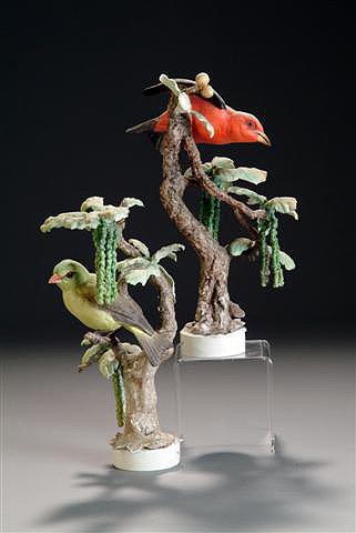 A PAIR OF DOROTHY DOUGHTY ROYAL WORCESTER FIGURINES: A PAIR OF DOROTHY DOUGHTY ROYAL WORCESTER FIGURINES "Scarlet Tanager." Male and female. Damaged. Height: 11 1/2", 11". (2)