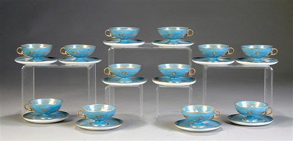 A SERVICE OF TWELVE CONTINENTAL FLORAL PAINTED TUR