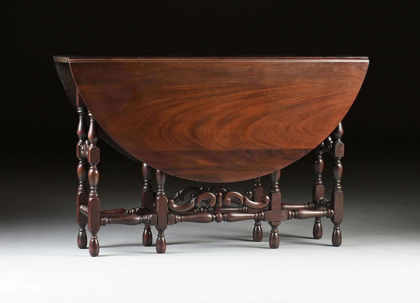 A CHARLES II STYLE MAHOGANY DROP-LEAF GATE LEG DINING (1 of 8)