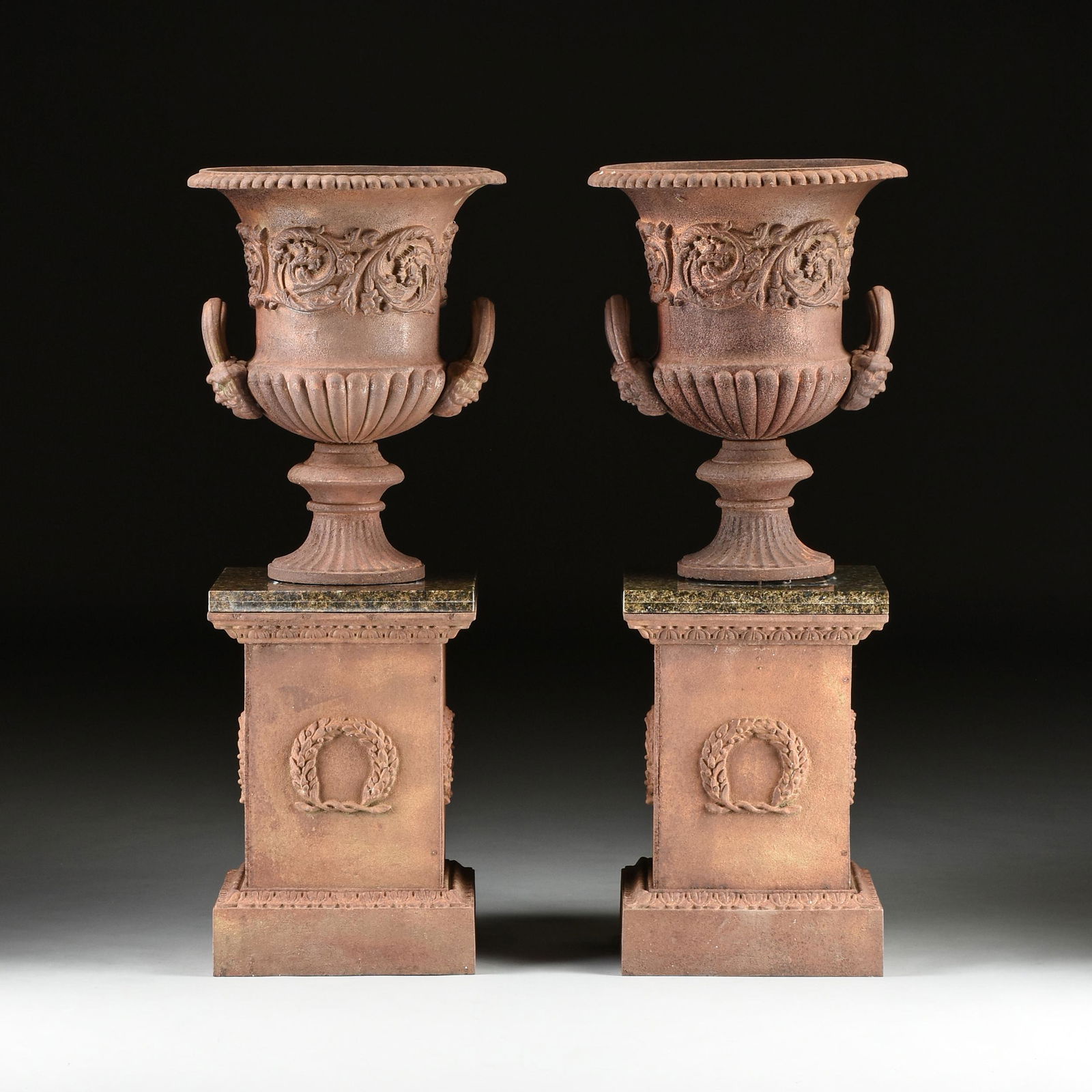 A PAIR OF VICTORIAN CAST IRON URN JARDINIÈRES AND (1 of 10)