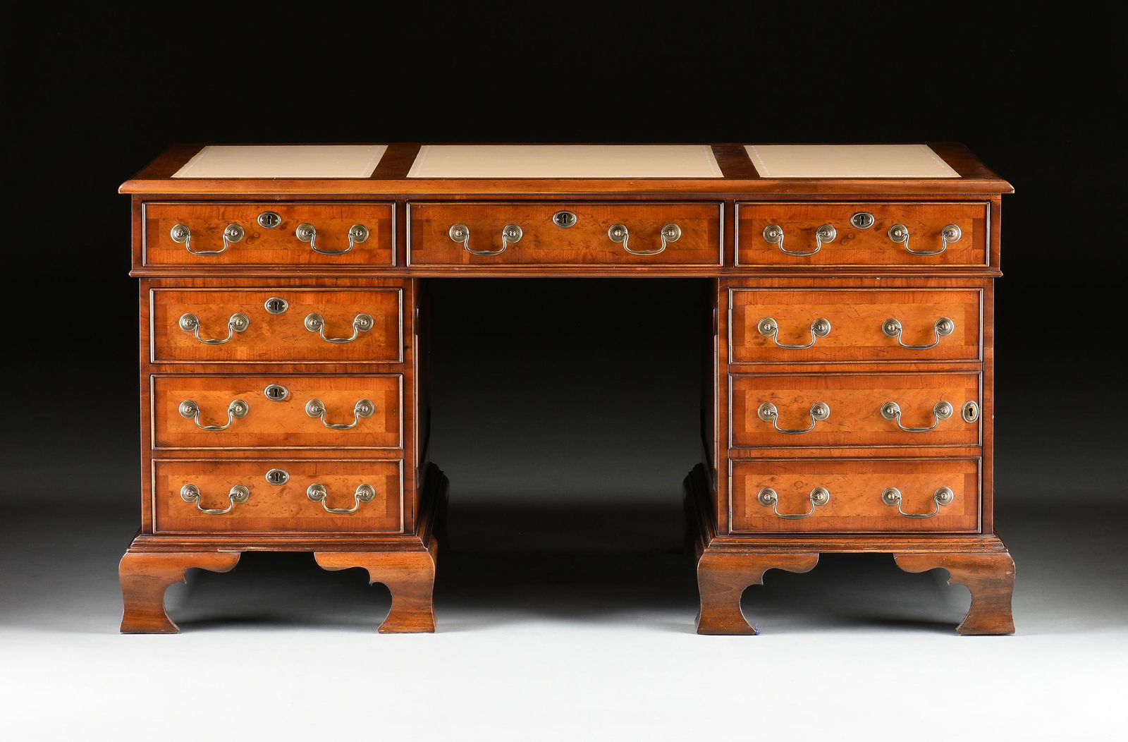 A GEORGE II STYLE WALNUT CREAM LEATHER TOP PARTNER'S (1 of 12)