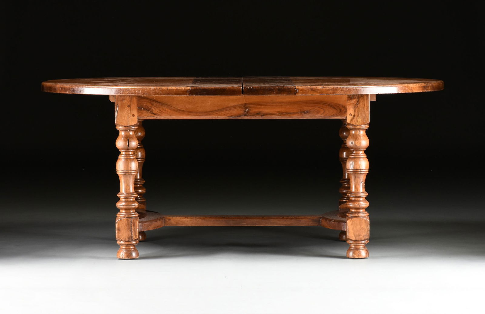 A FRENCH PROVINCIAL STYLE WALNUT DRAW-LEAF DINING (1 of 11)