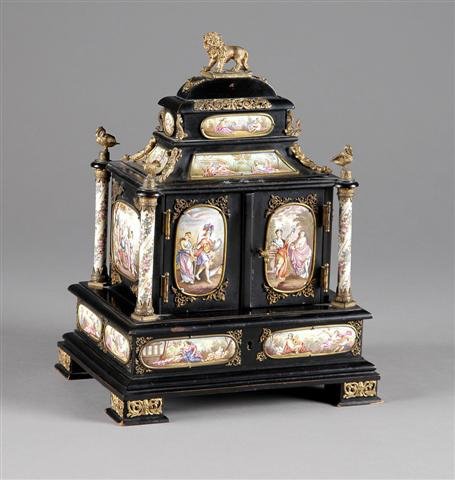 AN AUSTRIAN GILT BRONZE AND ENAMELED COPPER PLAQUE: AN AUSTRIAN GILT BRONZE AND ENAMELED COPPER PLAQUE MOUNTED EBONIZED WOOD COLLECTOR'S CABINET, Vienna, circa 1890, of rectangular form with painted plaques depicting various gods and goddesses of class