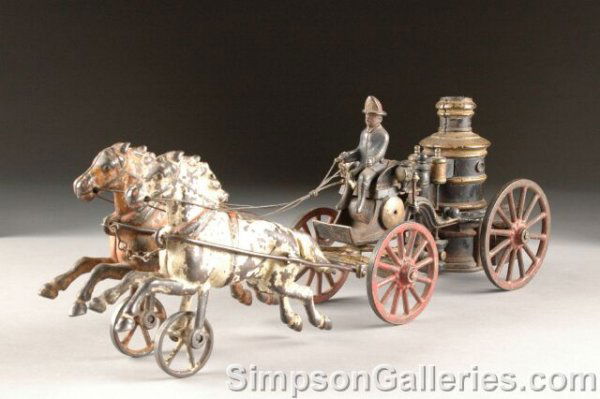 A 19TH CENTURY CAST-IRON FIRE ENGINE, water pump a: A 19TH CENTURY CAST-IRON FIRE ENGINE, water pump and two horses, with spoke wheels and single driver. Some paint loss. Height: 6 3/4", length: 18". From the estate of the late Jerry J. and Jean H. Moo