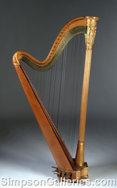 A SEBASTIAN ERARD, LONDON, MAPLE AND GILDED HARP,: A SEBASTIAN ERARD, LONDON, MAPLE AND GILDED HARP, first quarter 19th century, in the classical taste, the column decorated with anthemia, termes, and angels bearing wreaths and harps, the brass tuning