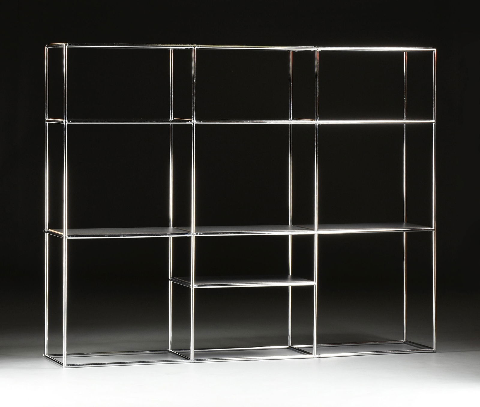 A CONTEMPORARY THREE SECTION CHROMED STEEL BOOK DISPLAY (1 of 8)