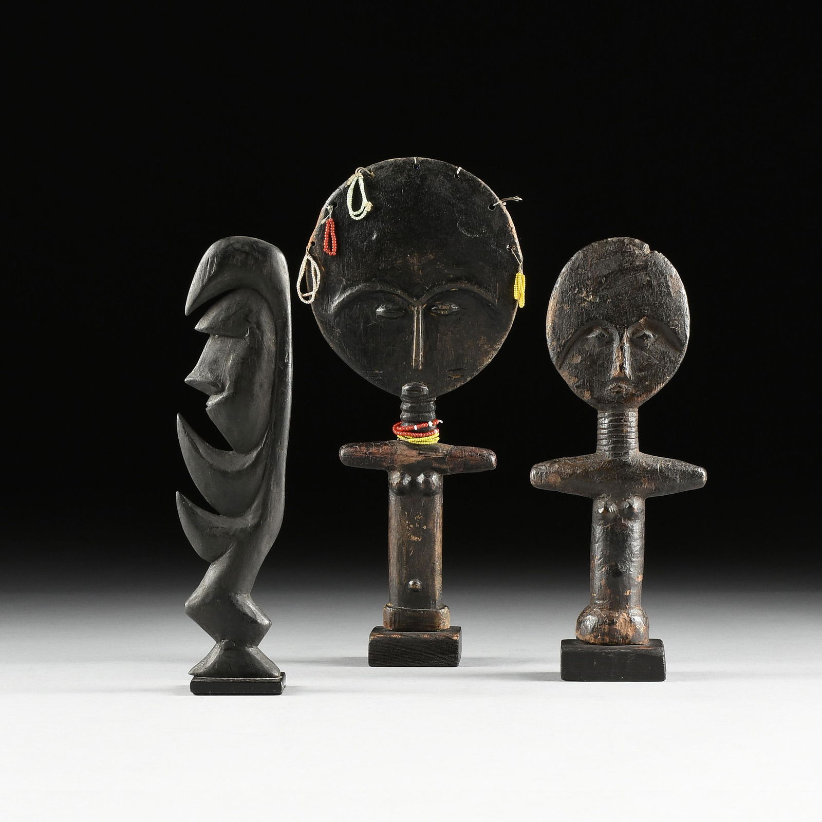 A GROUP OF THREE AFRICAN AND OCEANIC SCULPTURES, TWO (1 of 7)